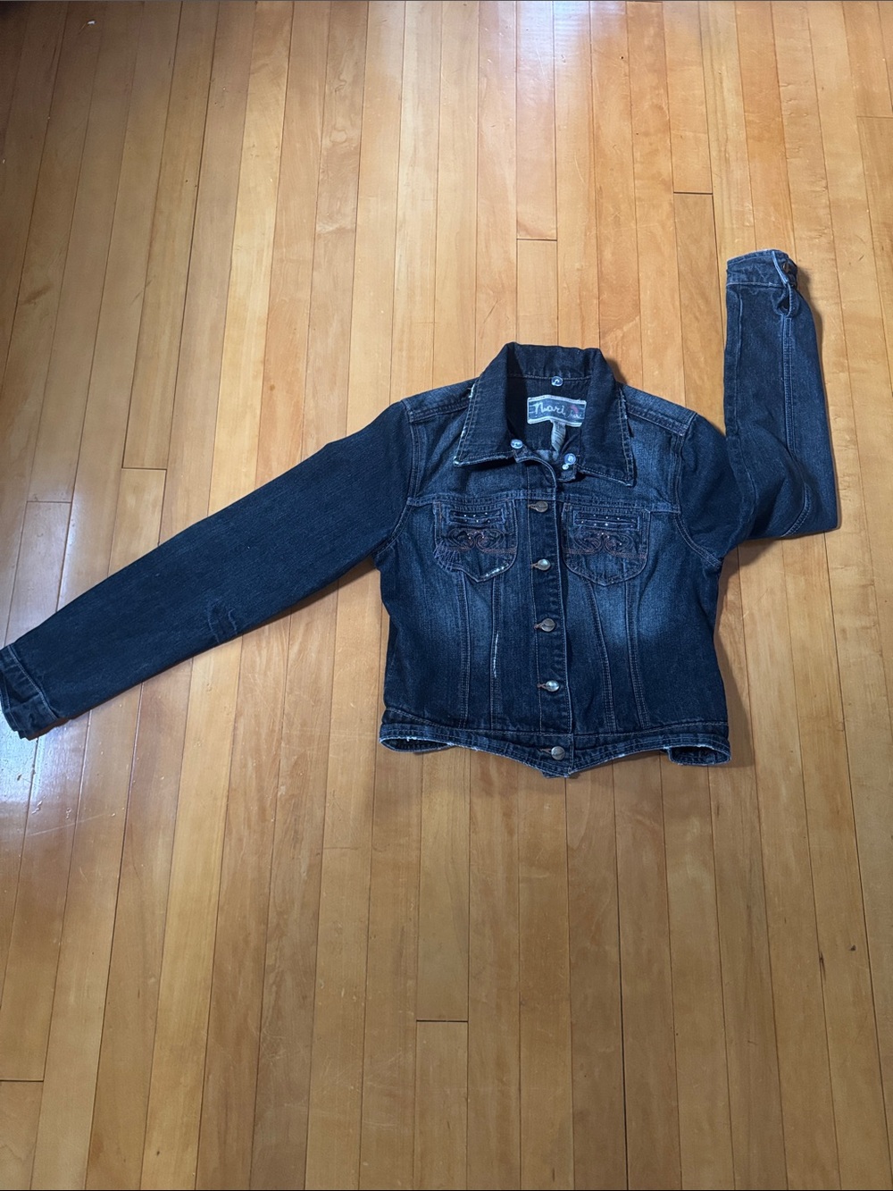 Nori Dark Wash Denim Jacket with pink faux rhinestones and orange stitching